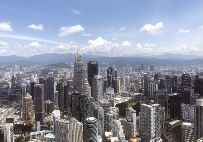 Kuala Lumpur Malaysia skyline city lights and modern buildings